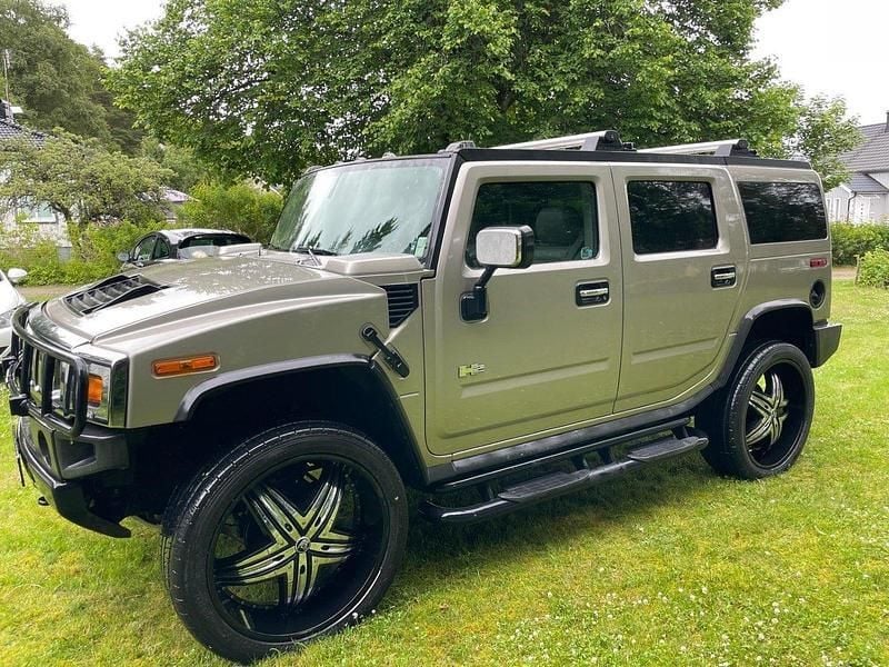 Grå Begagnad 2003 Hummer H2 SUV | 250 000 kr - Bild 1/4