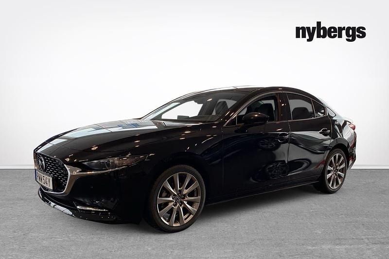 Svart Ny 2025 Mazda 3 Takumi-Line Sedan | 385 900 kr - Bild 1/4