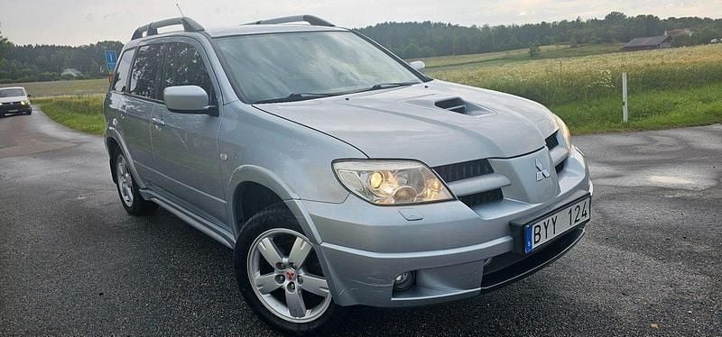 Silver Begagnad 2007 Mitsubishi Outlander SUV | 49 900 kr (Marknadspris) - Bild 1/4