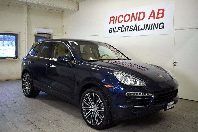 Mörkblå Begagnad 2012 Porsche Cayenne SUV | 189 900 kr - Bild 1/4