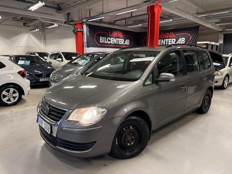 Grå Begagnad 2007 VW Touran Minibuss | 64 900 kr (Marknadspris) - Bild 1/4