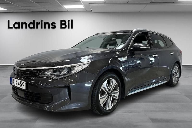 Grå (grå metallic) Begagnad 2018 Kia Optima Hybrid 2 Sedan | 192 300 kr (Bra pris) - Bild 1/4