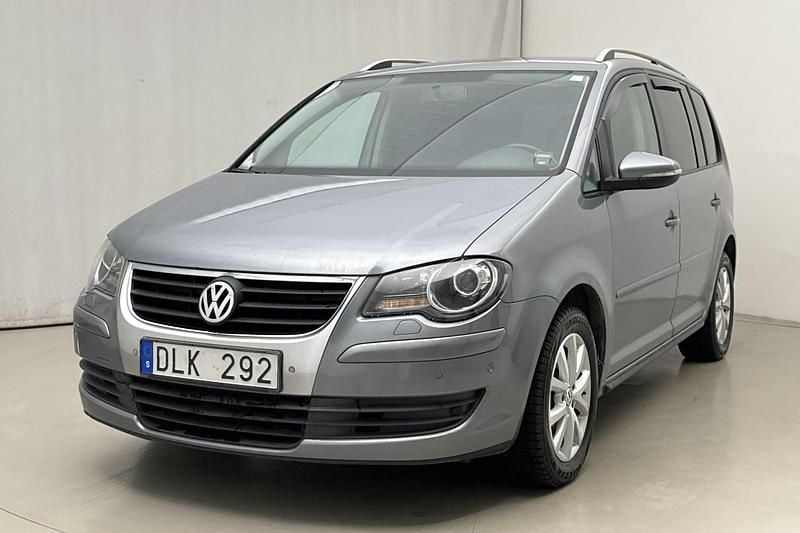 Mörkgrå Begagnad 2010 VW Touran Minibuss | 50 000 kr - Bild 1/4