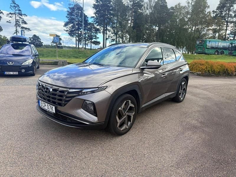 Brun Begagnad 2020 Hyundai Tucson Advanced SUV | 269 700 kr (Marknadspris) - Bild 1/4