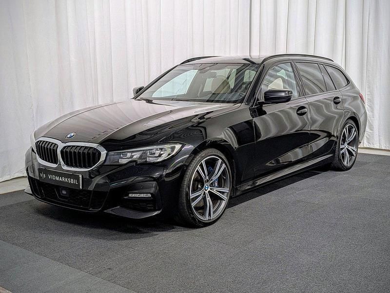 Svart Begagnad 2020 BMW 330 M Sport Kombi | 384 900 kr (Marknadspris) - Bild 1/4