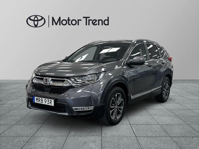 Ljusgrå (grå) Begagnad 2022 Honda CR-V Hybrid SUV | 329 000 kr (Marknadspris) - Bild 1/4