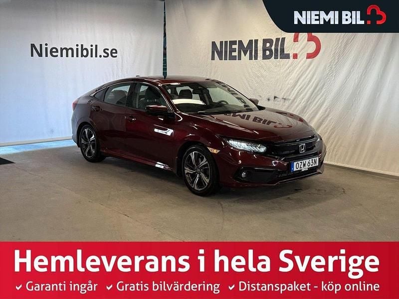 Mörkröd (röd) Begagnad 2020 Honda Civic Prestige Sedan | 259 900 kr (Lite dyr) - Bild 1/3
