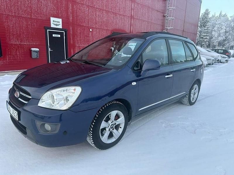 Blå Begagnad 2007 Kia Carens Minibuss | 43 900 kr (Marknadspris) - Bild 1/4