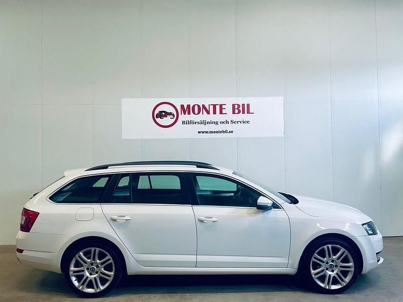 Begagnad Skoda Octavia Ambition 105 HK (77 kW) 2013 Vit Kombi