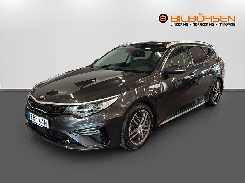 Grå Begagnad 2019 Kia Optima Hybrid Advance Sedan | 199 900 kr (Marknadspris) - Bild 1/4