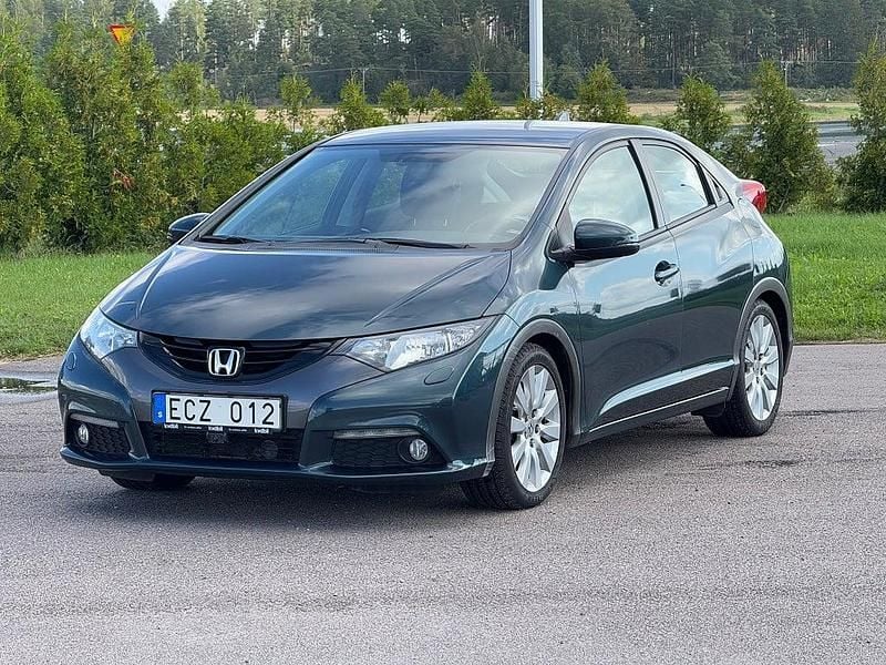 Mörkblå Begagnad 2012 Honda Civic Sport Halvkombi | 123 000 kr (Marknadspris) - Bild 1/4