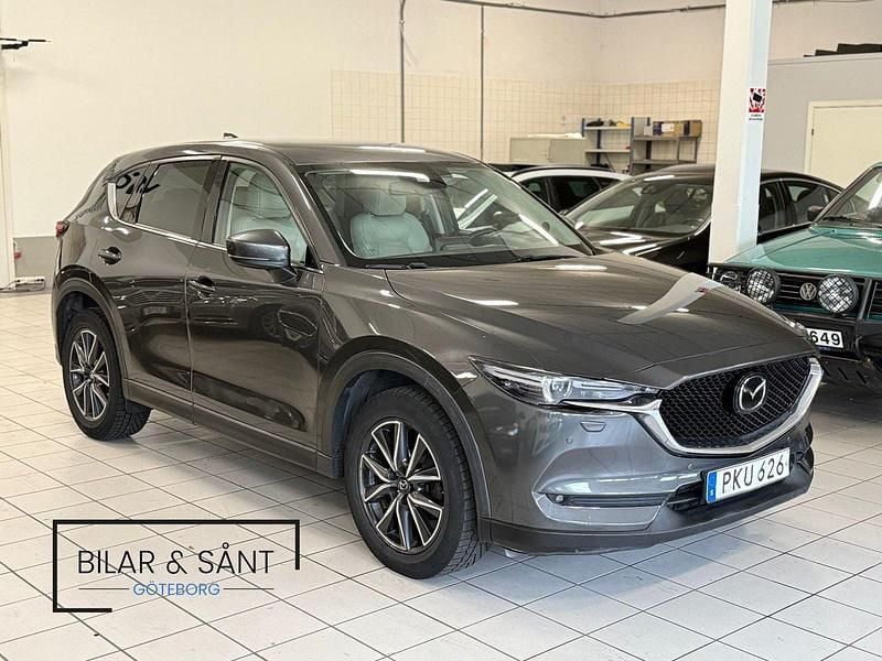 Grå Begagnad 2017 Mazda CX-5 SUV | 169 900 kr (Marknadspris) - Bild 1/4
