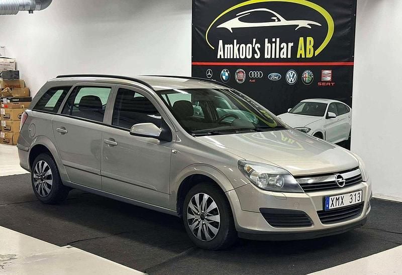 Grå Begagnad 2006 Opel Astra Kombi | 19 900 kr (Marknadspris) - Bild 1/4