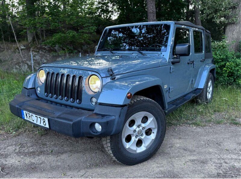 Grå Begagnad 2015 Jeep Wrangler Sahara SUV | 295 000 kr - Bild 1/4