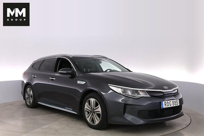 Grå Begagnad 2017 Kia Optima Hybrid 2 Sedan | 159 000 kr (Marknadspris) - Bild 1/4