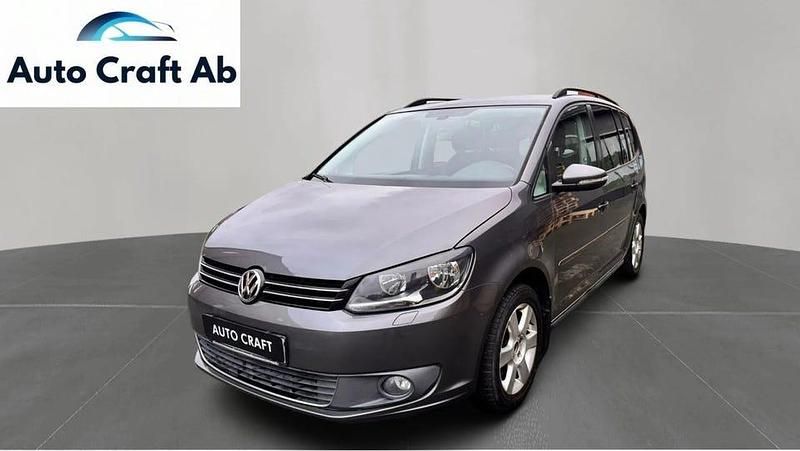 Mörkgrå Begagnad 2013 VW Touran Minibuss | 114 990 kr (Lite dyr) - Bild 1/3