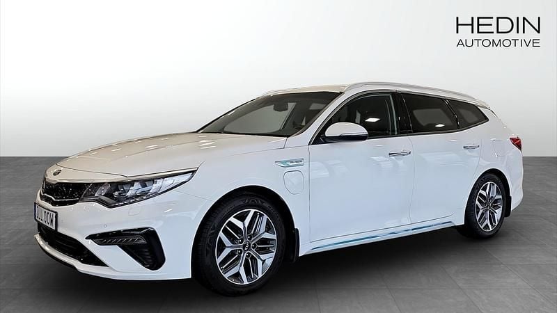 Vit (white) Begagnad 2020 Kia Optima Hybrid Advance Sedan | 199 900 kr (Marknadspris) - Bild 1/4
