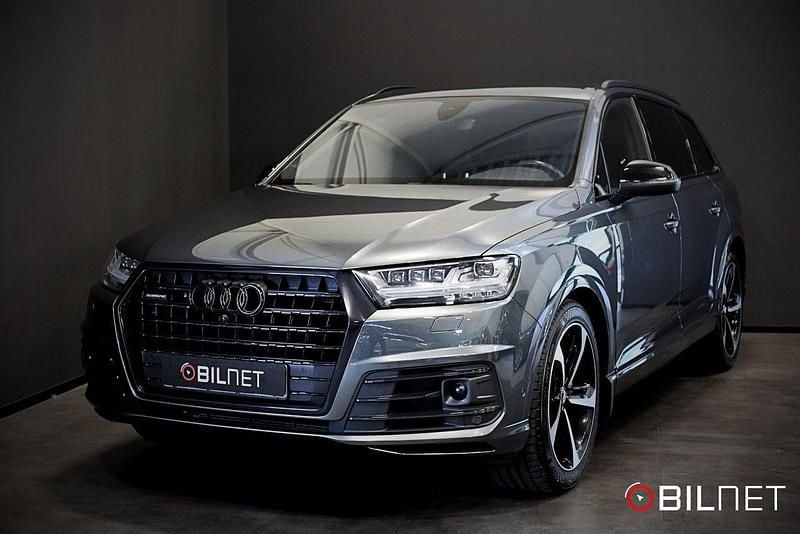 Röd (grå) Begagnad 2018 Audi Q7 S-Line SUV | 479 900 kr (Lite dyr) - Bild 1/4