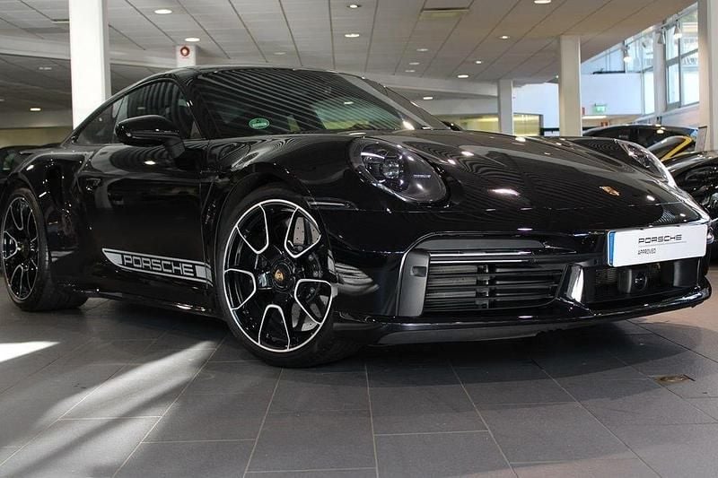 Svart Begagnad 2023 Porsche 911 Turbo S Sportkupé | 2 395 000 kr - Bild 1/4