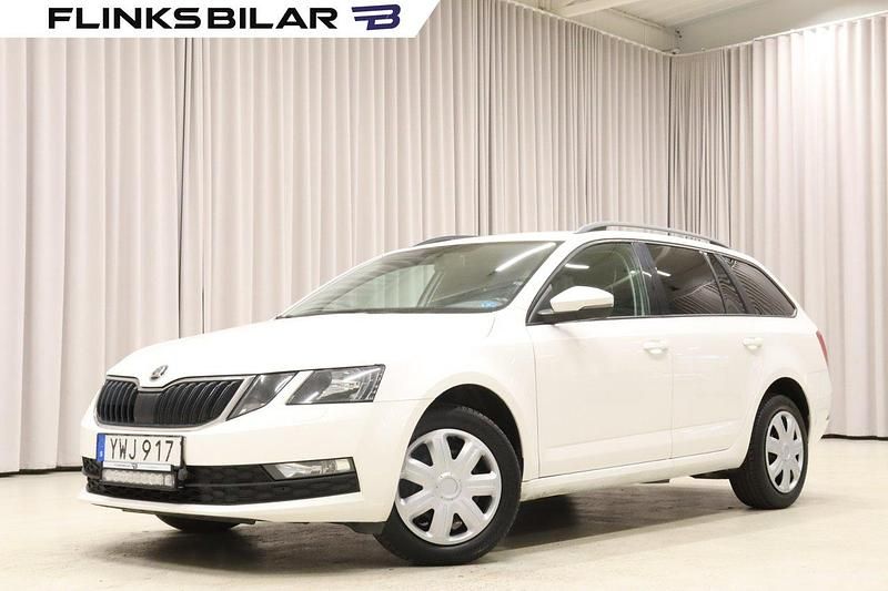 Vit Begagnad 2018 Skoda Octavia Kombi | 99 895 kr (Marknadspris) - Bild 1/4