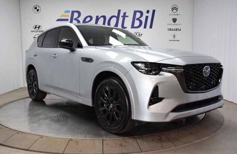 Grå Ny 2025 Mazda CX-60 Homura-Line SUV | 605 100 kr (Marknadspris) - Bild 1/3