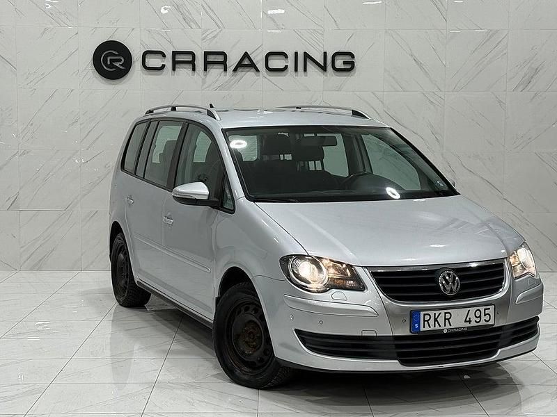 Silver Begagnad 2009 VW Touran Minibuss | 34 900 kr (Marknadspris) - Bild 1/4