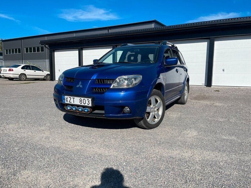 Blå Begagnad 2006 Mitsubishi Outlander SUV | 29 900 kr (Marknadspris) - Bild 1/2