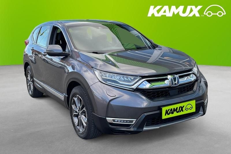 Silver/grå Begagnad 2021 Honda CR-V Hybrid SUV | 264 900 kr (Bra pris) - Bild 1/4