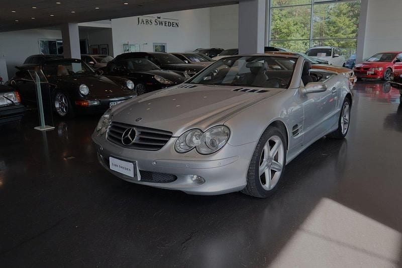 Silver (silver metallic) Begagnad 2006 Mercedes SL500 Cab | 199 900 kr - Bild 1/4
