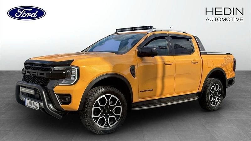 Orange Begagnad 2024 Ford Ranger Wildtrack Pickup | 649 875 kr (Superpris) - Bild 1/4