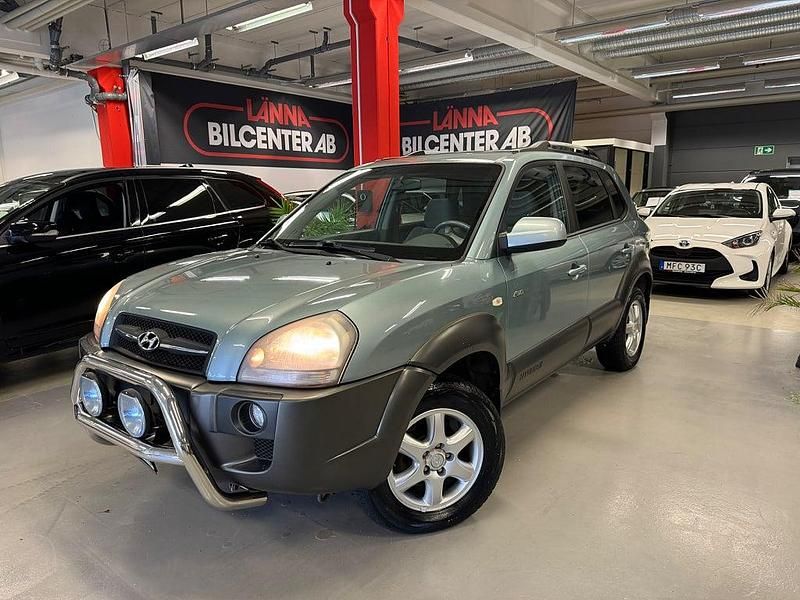 Ljusgrön Begagnad 2005 Hyundai Tucson SUV | 44 900 kr (Bra pris) - Bild 1/4