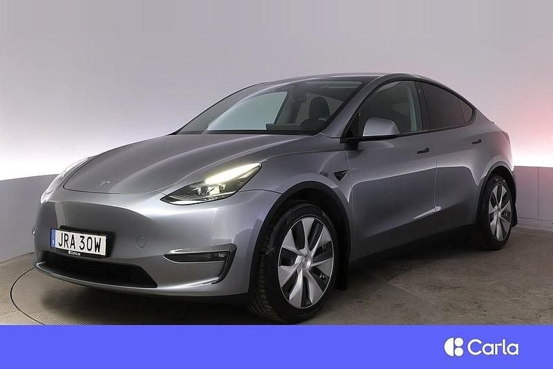 Grå Begagnad 2023 Tesla Model Y Long Range AWD SUV | 449 900 kr (Marknadspris) - Bild 1/3