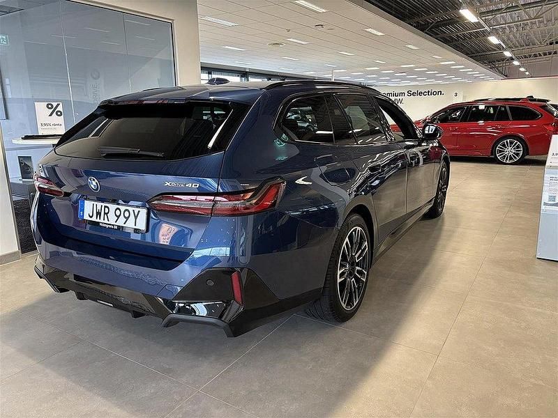 Begagnad BMW i5 Efficient Dynamics 442 kW (601 HK) 2024 Blå/lila Sedan