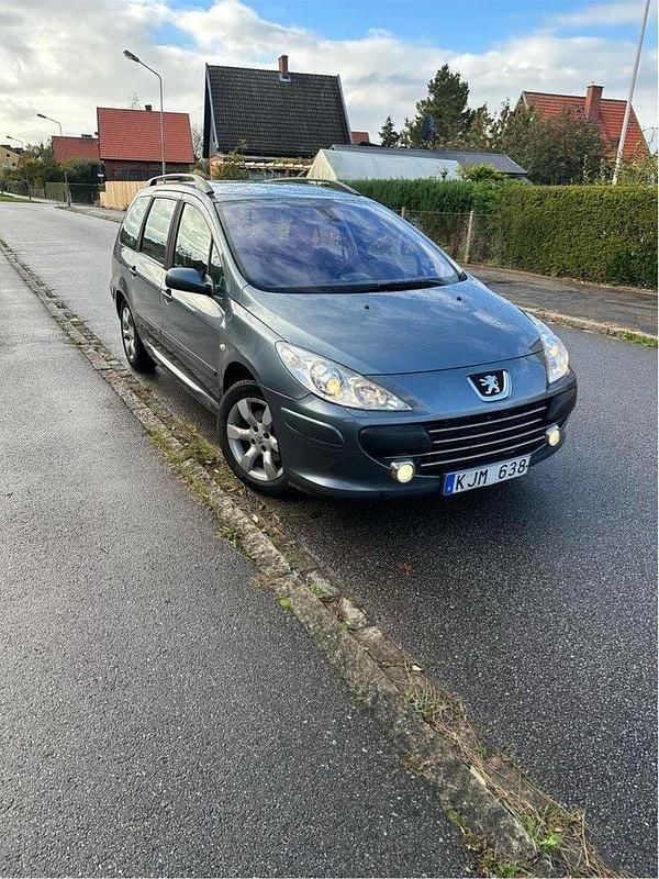 Grå Begagnad 2007 Peugeot 307 Kombi | 19 900 kr (Marknadspris) - Bild 1/4