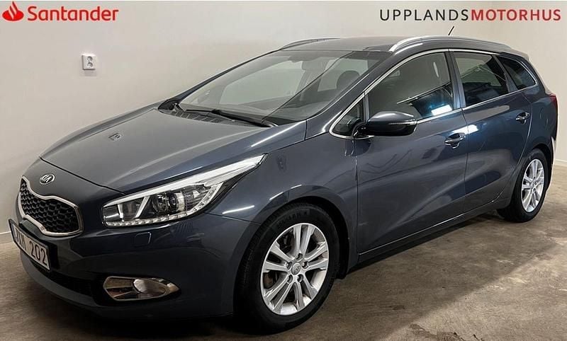Blå Begagnad 2013 Kia Ceed Sportswagon EX Kombi | 79 900 kr (Marknadspris) - Bild 1/4