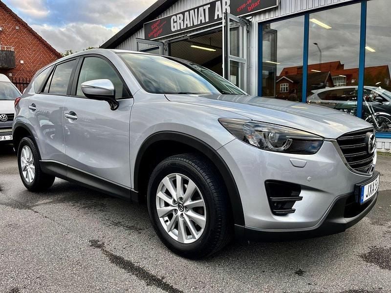 Grå (grå met) Begagnad 2015 Mazda CX-5 SUV | 119 000 kr (Marknadspris) - Bild 1/4