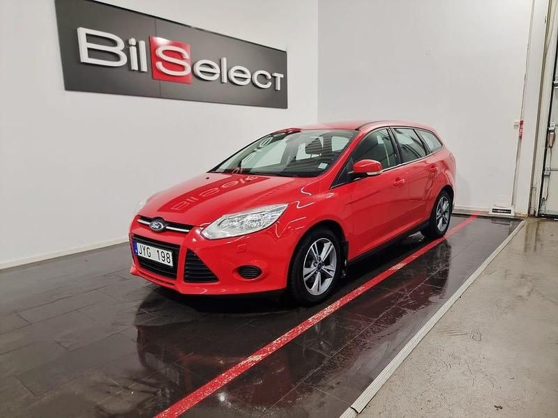 Röd Begagnad 2013 Ford Focus Kombi | 49 900 kr (Marknadspris) - Bild 1/4