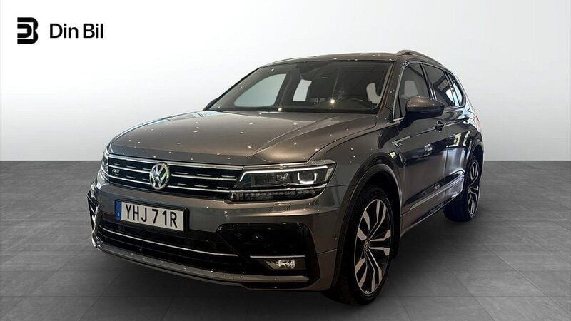 Grå (platinum grey metallic) Begagnad 2018 VW Tiguan Allspace R-line SUV | 349 900 kr (Lite dyr) - Bild 1/4