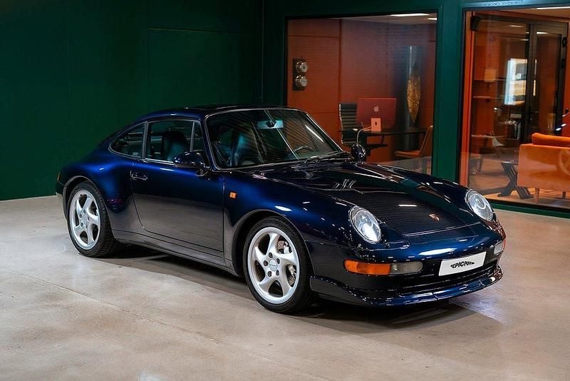 Mörkblå Begagnad 1995 Porsche 911 Carrera 4 | 879 900 kr - Bild 1/4