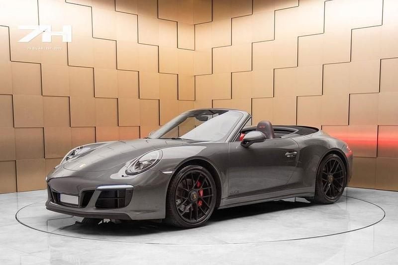 Mörkgrå Begagnad 2017 Porsche 911 Carrera 4 Cabriolet Cab | 1 379 900 kr - Bild 1/4