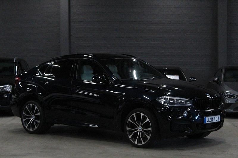 Svart (carbonsvart metallic) Begagnad 2016 BMW X6 M Sport SUV | 434 900 kr - Bild 1/4