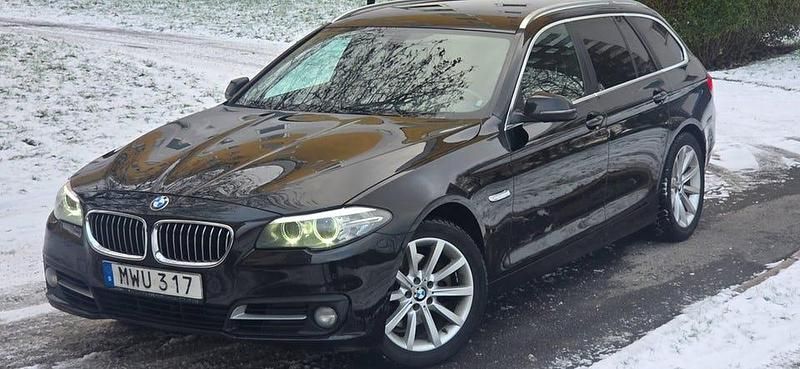 Svart Begagnad 2015 BMW 520 Kombi | 109 800 kr (Marknadspris) - Bild 1/4