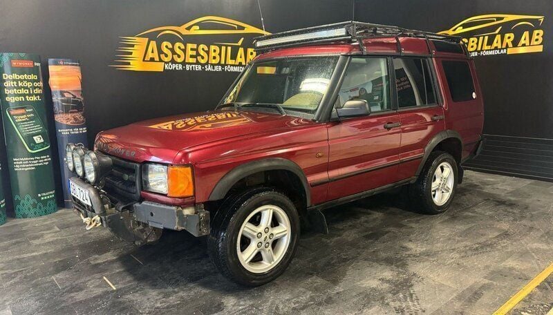Röd Begagnad 2001 Land Rover Discovery 2 SUV | 59 900 kr - Bild 1/1