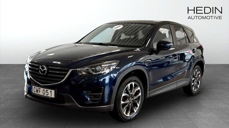 Blå (blue) Begagnad 2015 Mazda CX-5 Optimum SUV | 139 000 kr (Marknadspris) - Bild 1/4