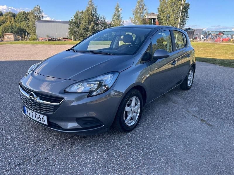 Grå Begagnad 2016 Opel Corsa Enjoy Halvkombi | 99 000 kr (Marknadspris) - Bild 1/4