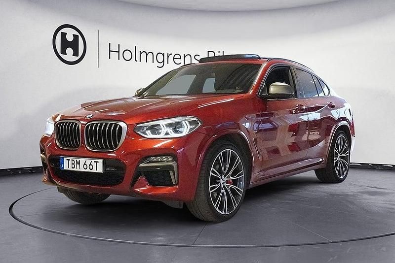 Flamencoröd brillianteffekt Begagnad 2021 BMW X4 M Sport SUV | 519 800 kr - Bild 1/4