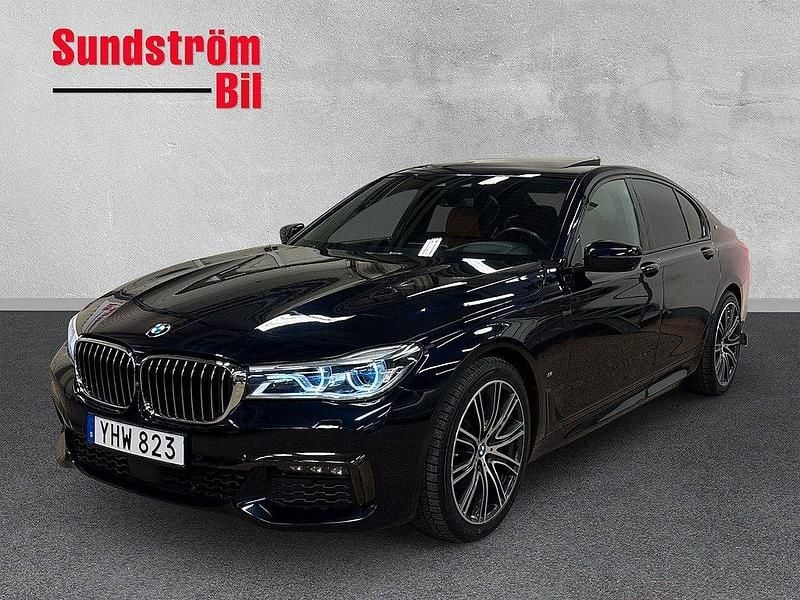Svart Begagnad 2016 BMW 740 M Sport Sedan | 379 900 kr - Bild 1/3