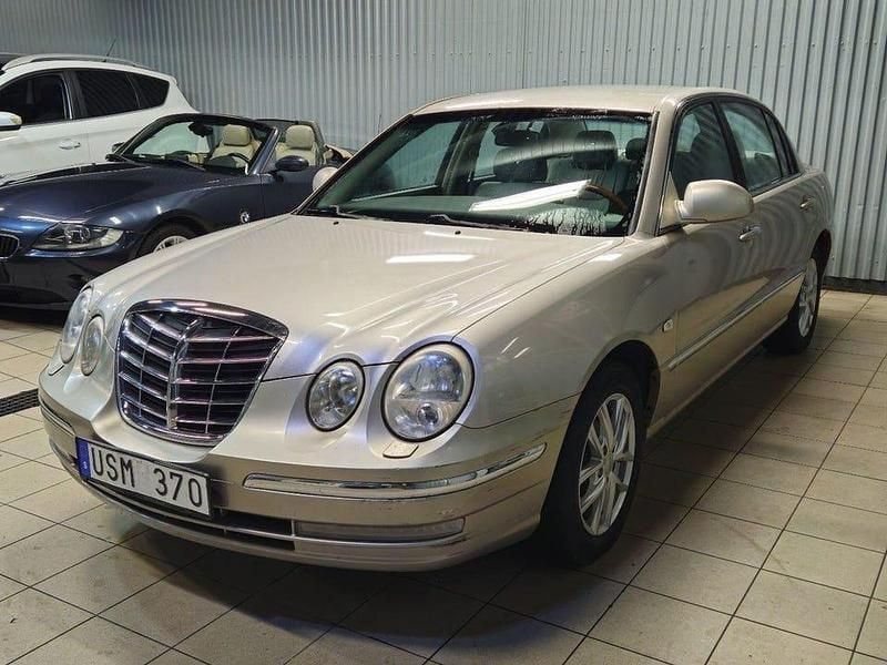 Begagnad Kia Opirus 203 HK (149 kW) 2004 Gul Sedan