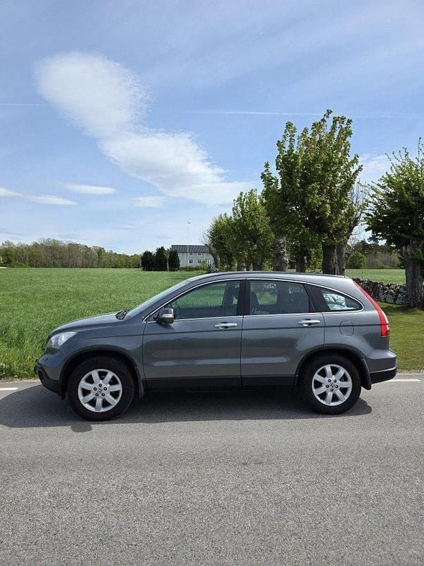 Grå Begagnad 2009 Honda CR-V SUV | 74 000 kr (Bra pris) - Bild 1/4
