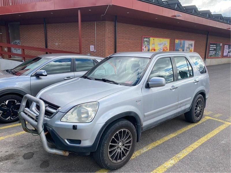 Silver Begagnad 2004 Honda CR-V SUV | 30 000 kr (Marknadspris) - Bild 1/4
